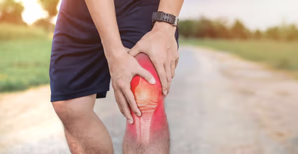 A man with a red knee.